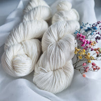 Luxurious undyed 4 ply weight, 25% mulberry silk, 75% superwash merino (extra fine), 400m/100g, 4/16 NM